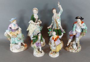 A pair of Sitzendorf porcelain figures decorated in polychrome enamels and highlighted with gilt,