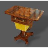 A Victorian rosewood games/worktable, the chessboard drop flap top above a frieze drawer and wool