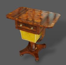 A Victorian rosewood games/worktable, the chessboard drop flap top above a frieze drawer and wool