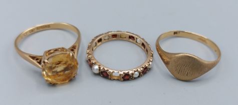 9ct gold Citrine set dress ring together with a 9ct gold signet ring a 9ct gold eternity ring set
