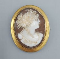 A 9ct gold framed cameo brooch, 3.5cms by 4.5cms, 7.7gms