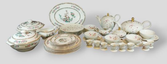 A Wedgewood part dinner service with Indian Tree decoration together with a German breakfast set