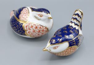 A Royal Crown Derby paperweight in the form of a bird together with another similar, both with