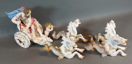 A Meissen porcelain group in the form of Neptune and Putti in a chariot with four seahorses, all