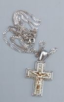A 9ct white gold crucifix pendant set with diamonds, together with a 9ct gold chain, 9.9gms