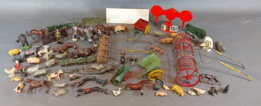 A collection of lead farm animals, together with other similar toys