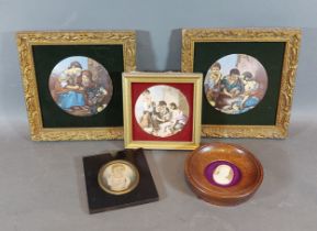 A 19th Century portrait miniature together with four similar miniatures