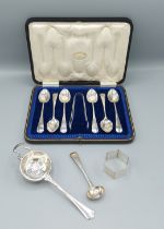 A set of six Sheffield silver teaspoons with tongs in fitted case together with a Birmingham