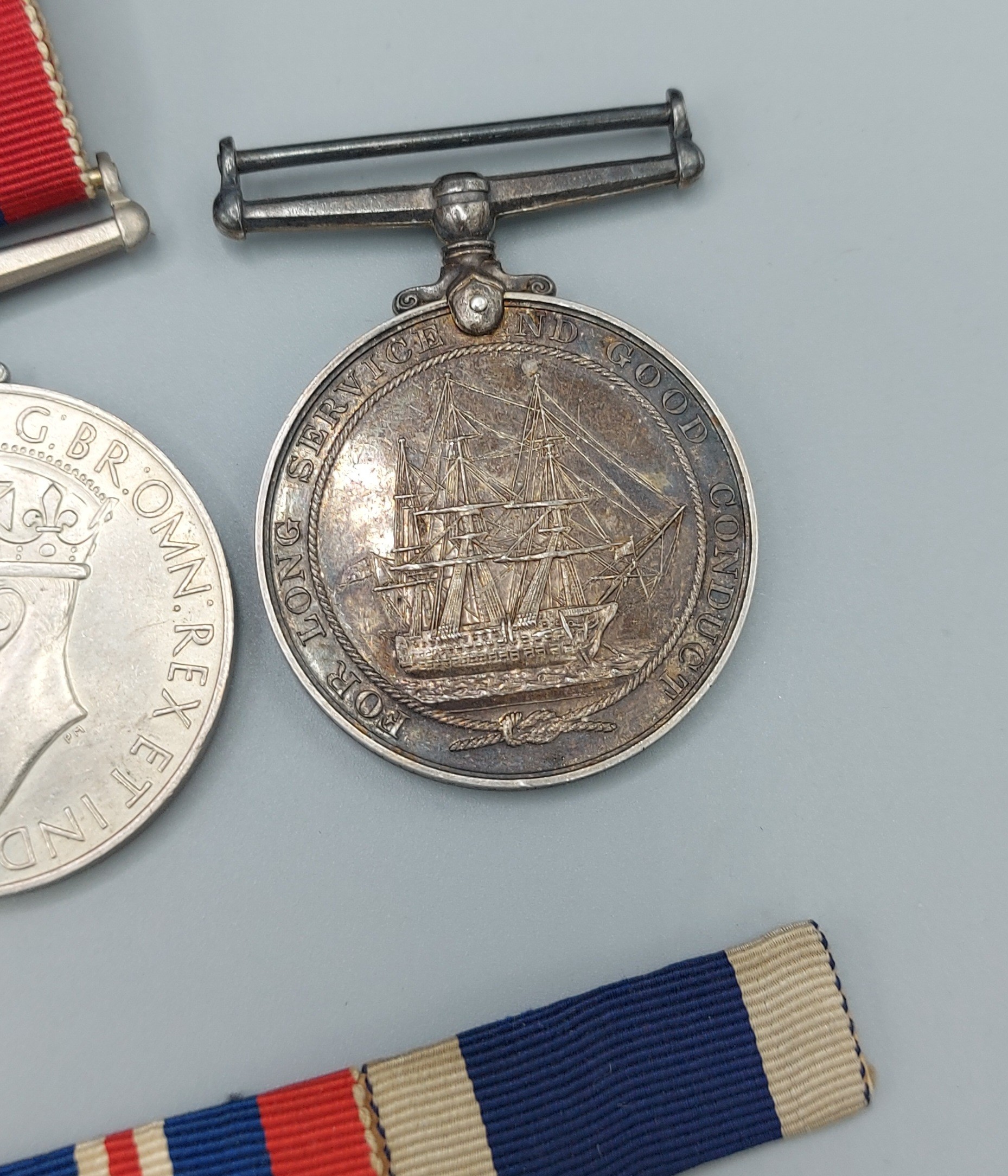 A Second World War Royal Navy group of seven medals to include The 1939-1945 Star, The Atlantic - Image 2 of 3
