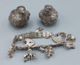 A Edwardian silver salt and pepper in the form of birds, Chester 1905, markers Sampson Mordan & Co