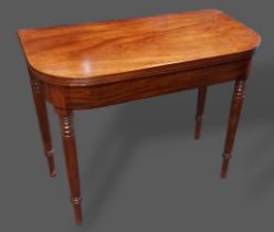 A 19th Century mahogany tea table, the moulded hinged top above a plain freeze and raised upon