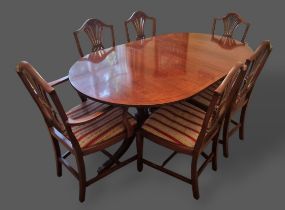 A Regency style dining suite comprising a twin pillar dining table with single extra leaf, 209cmsx