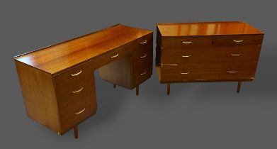 A Stag dressing table, the moulded top above seven drawers raised upon turned legs, 126cms wide by