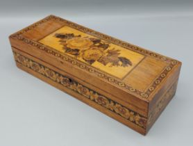A late 19th Century Tonbridge ware box, decorated Berlin Tapestry 26.5cms long