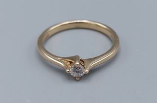 A 9ct gold solitaire Diamond ring, ring size O, 2.2gms