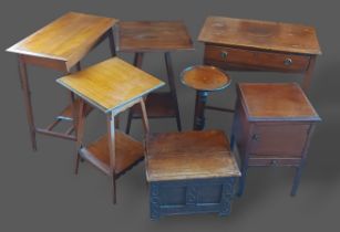 An oak side table together with three occasional tables, a small oak coffer, a wine table and a