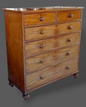 A 19th Century mahogany large chest of two short and four long drawers with knob handles raised upon
