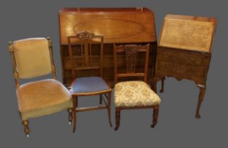 A mahogany bureau, together with another smaller bureau, two occasional tables and four side chairs