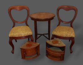 A pair of mahogany balloon back dining chairs, together with a occasional table and two small corner