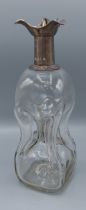 An Edwardian silver mounted glass decanter, Sheffield 1902, 27cms tall