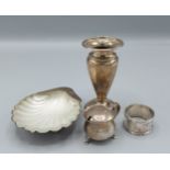 A Sheffield silver butter dish of scallop form together with a Birmingham silver spill vase, a
