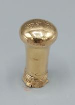 An 18ct gold parasol handle cap, (removed), 7.1gms