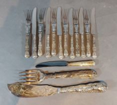 A set of six silver handled cake knives and forks together with a collection of silver plated flat