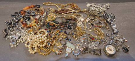 A collection of jewellery to include necklaces, brooches and two watches