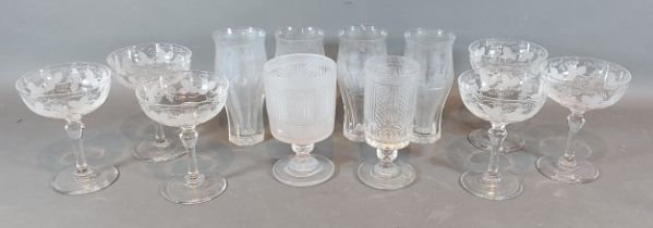 A set of six Champagne glasses with etched decoration, together with other glassware