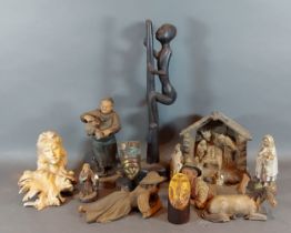An African carved figure together with other plaster figures and related items