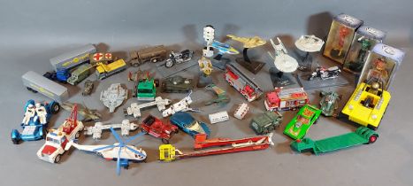 A Dinky Toys Lunar Rover together with a collection of similar model vehicles