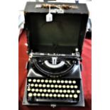 Imperial portable typewriter - The good companion model T, serial number X927, Made in Leicester. In