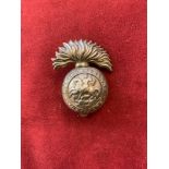British WWI Northumberland Fusiliers Cap Badge, brass and slider