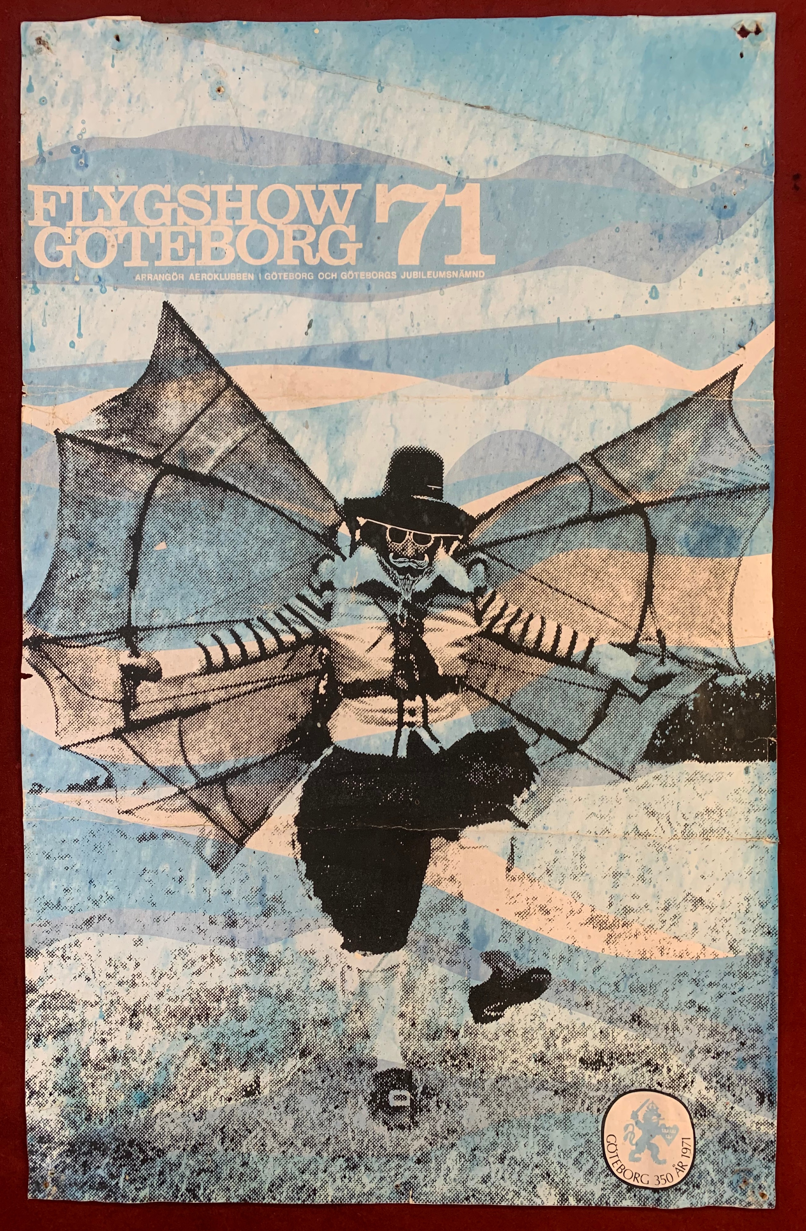 Poster-Flyg Show-Goteborg 1971-coloured poster of man with wings-measurement 49cm x 31cm worn