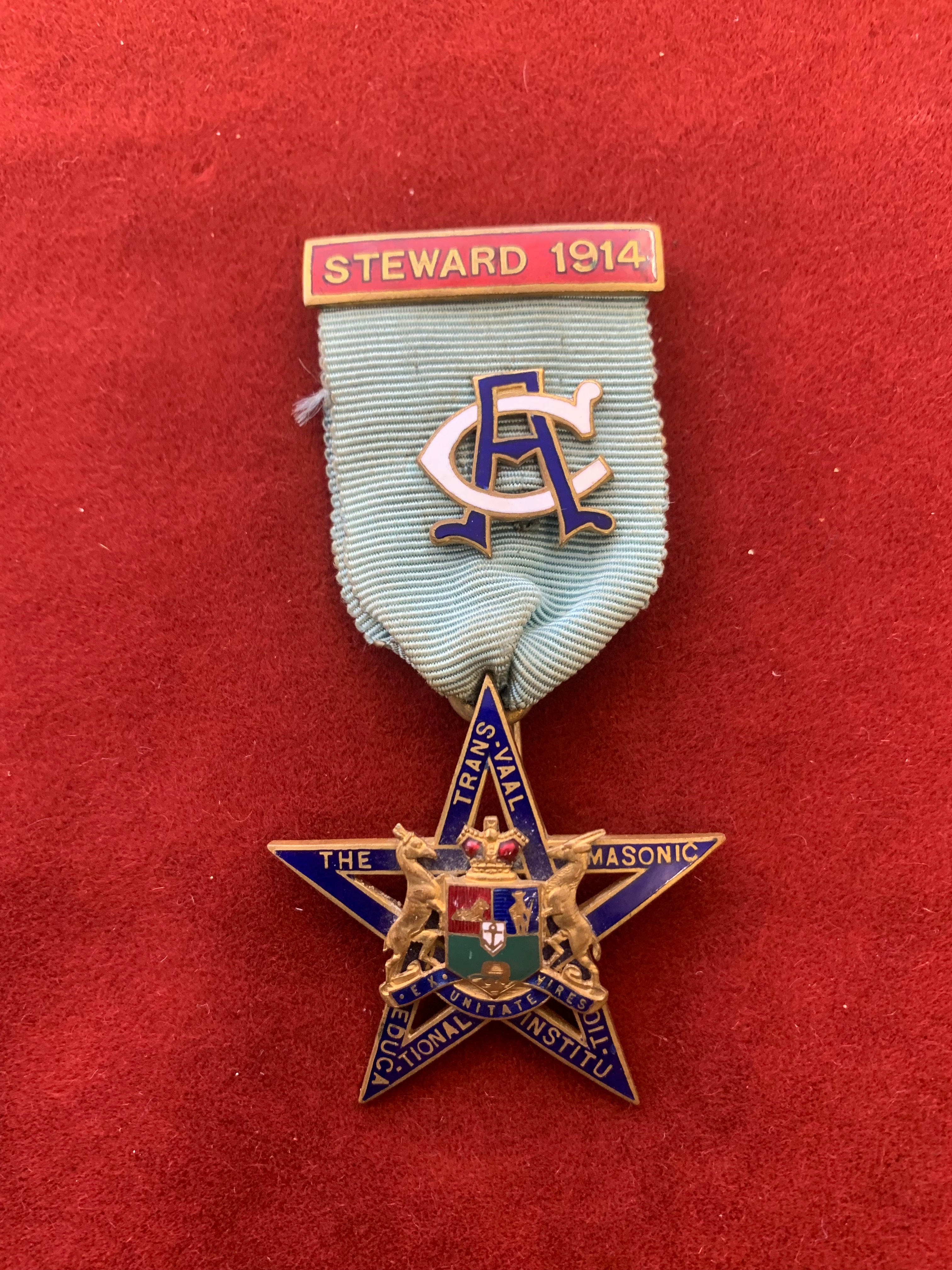 The Trans-Vaal Masonic Education Institution Stewards Jewel 1914, Silver Gilt and Enamel. Made by