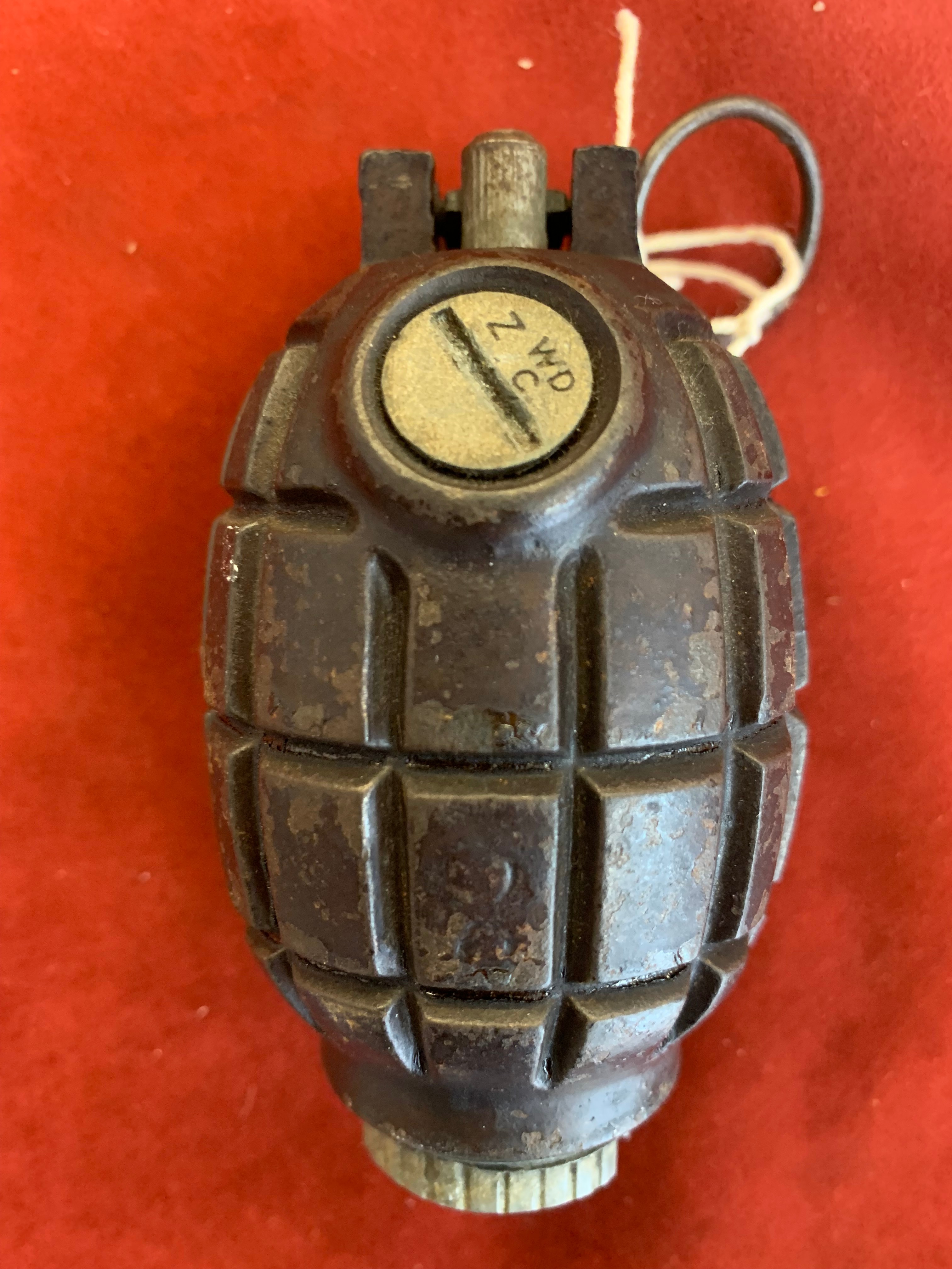 British WWII No.36 Mills Bomb made by Qualcast, Derby. With original paint and components