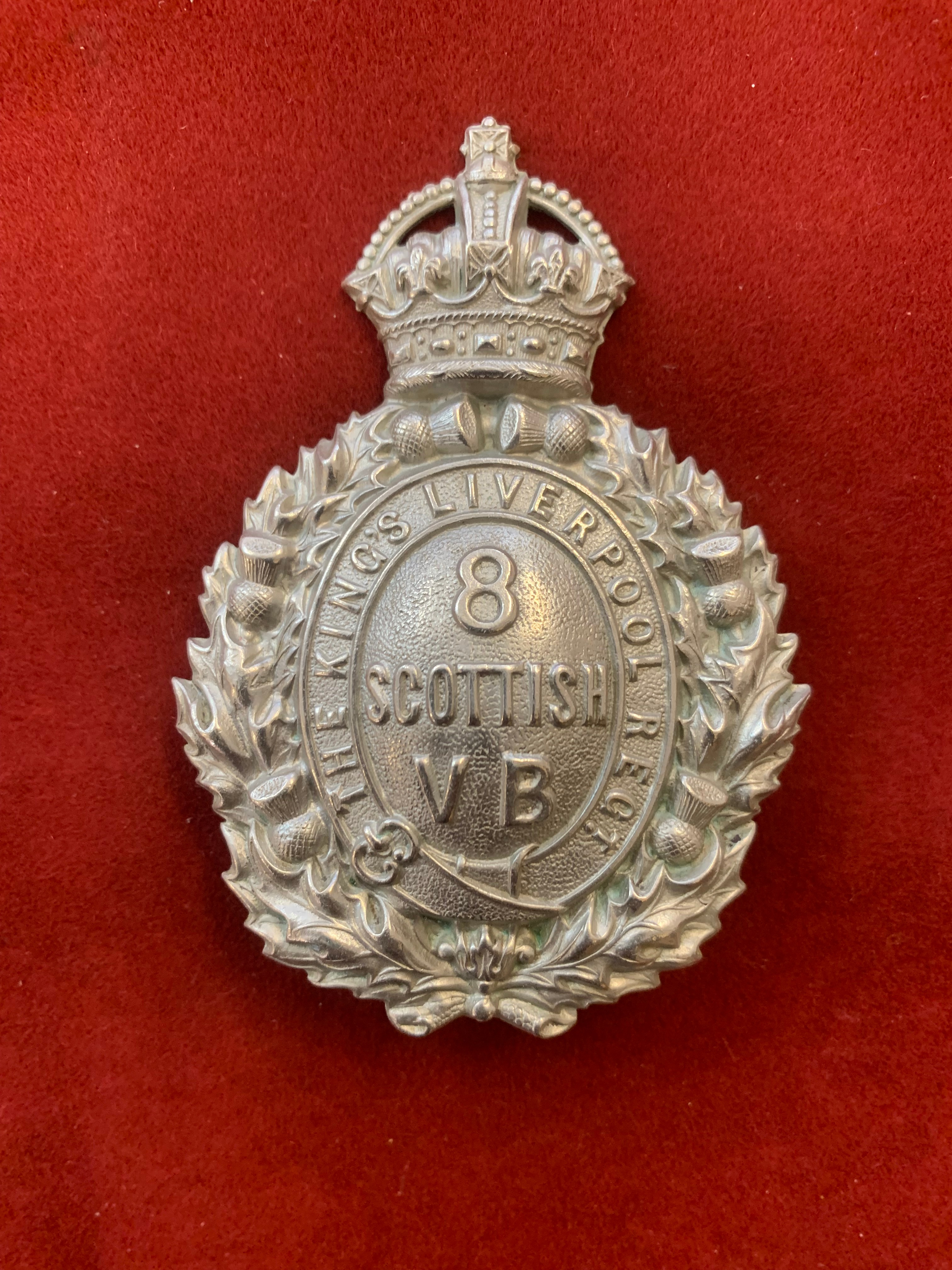 British WWI 8th Scottish Volunteer Battalion, The king's Liverpool Regiment, cap badge, white-