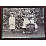 Old Photograph Probably Victorian of young lady with 2 children in hand cart R. measurements 16cm