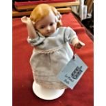 (1) - China Figurine - 'Le Planel Doll' - a reproduction of an all Bisque Doll made in Germany -