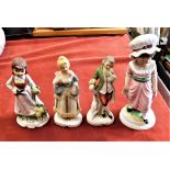 (4)- China Figures - no makers name (1 man, woman, child small) 1 girl large - good condition
