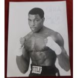 Frank Bruno signed RP photograph 1980s, image after his famous 1983 match against Floyd "Jumbo"