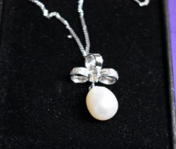 Pearl Drop Necklace - Single pearl drop on a silver chain, by Danbury Mint, boxed, best condition