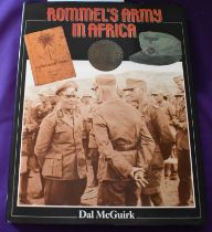 Rommel's Army in Africa by Dal McGuirk in hardback with original dust wrap. An interesting read.