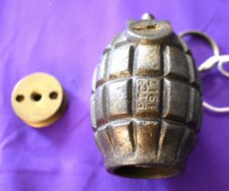 British WWI No.23 Mills Bomb made by P.T. Co. 1917 in very good condition with remnants of
