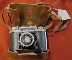 The Ensign Commando Camera was made in 1945 - A dual format camera taking either 12 or 16