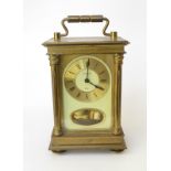 CARRIAGE CLOCK, brass cased bell strike carriage clock by H Samuel with hour and half hour strike,