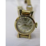 LADY'S 9ct GOLD CASED ROLEX PRECISSION WRIST WATCH on 9ct gold bracelet, movement appears to be in