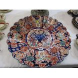 ORIENTAL CERAMICS, Imari scallop edge shallow charger with vase of flowers central reserve 46cms