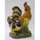 MAJOLICA, colour glazed group of cockerel and hen, 21cm height
