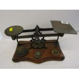 ANTIQUE POSTAL SCALES, walnut serpentine base postal scales, 8 graduated weights